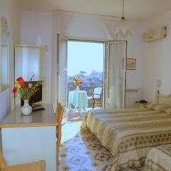 Отель La Margherita - Villa Giuseppina Италия, Скала - отзывы, цены и фото номеров - забронировать отель La Margherita - Villa Giuseppina онлайн комната для гостей фото 2