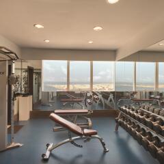 Отель Ramada Corniche Абу-Даби фитнесс-зал