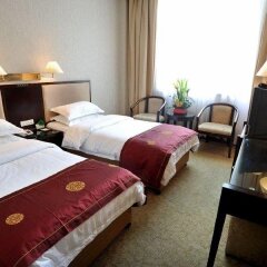 Отель Sunjoy Inn комната для гостей фото 5