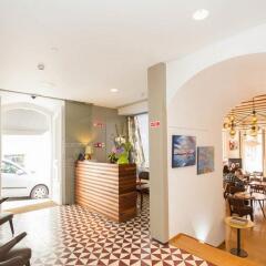 Lisboa Carmo Hotel интерьер отеля