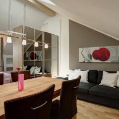 Апартаменты Paleo Finest Serviced Apartments Мюнхен комната для гостей