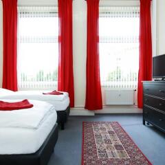 Отель Berliner City Pension Uhlandstrasse Берлин комната для гостей фото 3