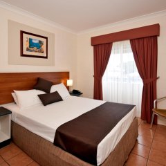 Отель Cairns Queens Court Австралия, Кэрнс - отзывы, цены и фото номеров - забронировать отель Cairns Queens Court онлайн комната для гостей