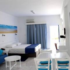 Отель Flokkas Hotel Apartments Кипр, Протарас - отзывы, цены и фото номеров - забронировать отель Flokkas Hotel Apartments онлайн комната для гостей