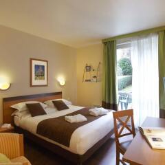 Citadines Apart`Hotel Montmartre Париж комната для гостей фото 3