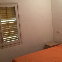 Отель Apartamento Calafats - Lloret Beach Испания, Льорет-де-Мар - отзывы, цены и фото номеров - забронировать отель Apartamento Calafats - Lloret Beach онлайн комната для гостей фото 4