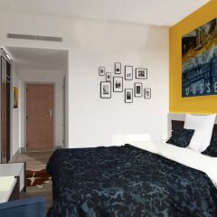 Отель Carathotel Dusseldorf City Дюссельдорф комната для гостей фото 3