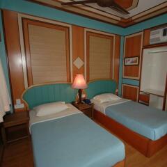 Отель Shari-La Island Resort комната для гостей