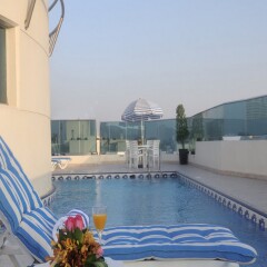 XCLUSIVE Hotel Apartments бассейн