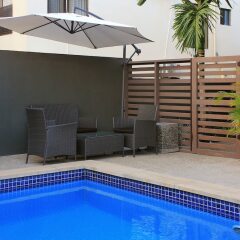 Апартаменты GreyStone Apartments 03 бассейн фото 2