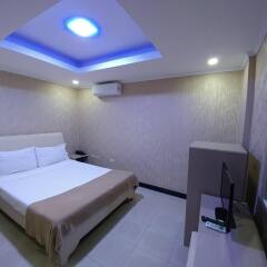 Отель OYO 700 Pj Inn Hotel Филиппины, Пампанга - отзывы, цены и фото номеров - забронировать отель OYO 700 Pj Inn Hotel онлайн комната для гостей