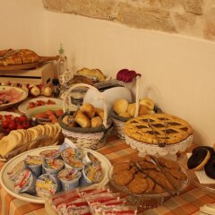 Отель Trulli Pietradimora B&B Альберобелло питание