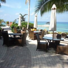 Отель Palmyra Luxury Beach Condo пляж