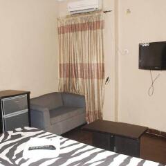 Отель Emglo Suites удобства в номере