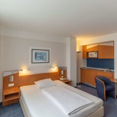 Отель Ramada by Wyndham Hannover Германия, Ганновер - отзывы, цены и фото номеров - забронировать отель Ramada by Wyndham Hannover онлайн комната для гостей фото 5