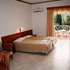Отель Angelina Hotel & Apartments Греция, Сидари - отзывы, цены и фото номеров - забронировать отель Angelina Hotel & Apartments онлайн комната для гостей фото 3