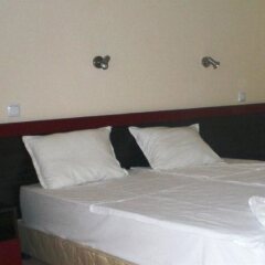 Sunrise Hotel комната для гостей