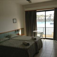 Отель Porto Del Sol Guesthouse комната для гостей