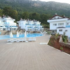 Апартаменты Orka Royal Hills Apartment Олудениз бассейн фото 2