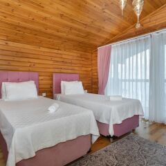 Villa Zeytin by Akdenizvillam Турция, Калкан - отзывы, цены и фото номеров - забронировать отель Villa Zeytin by Akdenizvillam онлайн комната для гостей фото 2