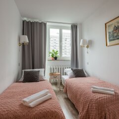 Отель UNIT Short Rent Apartment by Warsaw Metro Station Польша, Варшава - отзывы, цены и фото номеров - забронировать отель UNIT Short Rent Apartment by Warsaw Metro Station онлайн комната для гостей фото 4