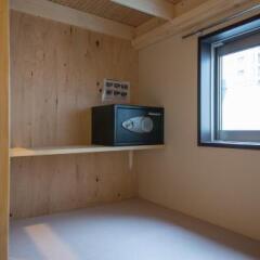 Nekokura Hostel Фукуока сейф в номере