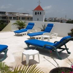 Отель El Campanario Studios & Suites Мексика, Плая-дель-Кармен - отзывы, цены и фото номеров - забронировать отель El Campanario Studios & Suites онлайн с домашними животными