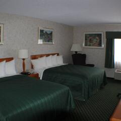 Отель All Seasons Inn and Suites комната для гостей фото 2