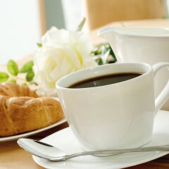 Гостиница Home Suites в номере