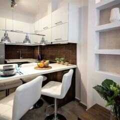 Отель Rigas Luxury Flat White Tower в номере