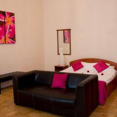 Отель Karma Boutique Apartments Венгрия, Будапешт - отзывы, цены и фото номеров - забронировать отель Karma Boutique Apartments онлайн комната для гостей фото 3