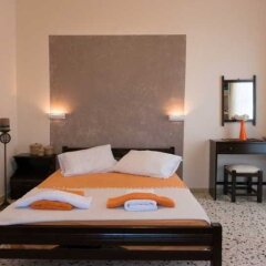 Отель Akrotiri Dreams комната для гостей