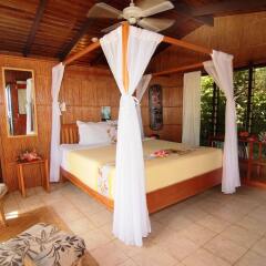 Отель Coconut Grove Beachfront Cottages комната для гостей фото 3