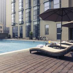 Отель Xiamen Yilai International Apartment Hotel Китай, Сямынь - отзывы, цены и фото номеров - забронировать отель Xiamen Yilai International Apartment Hotel онлайн бассейн фото 2