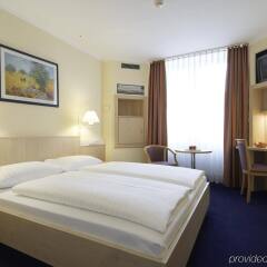 Отель Fleming's Express Hotel Frankfurt Германия, Франкфурт-на-Майне - отзывы, цены и фото номеров - забронировать отель Fleming's Express Hotel Frankfurt онлайн комната для гостей фото 3