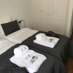Апартаменты Saldanha Residence Apartments сейф в номере