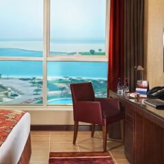 Отель Khalidiya Palace Rayhaan by Rotana, Abu Dhabi удобства в номере