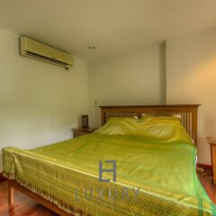 Отель Amazing 5 Bedroom Condo on the Beach SP комната для гостей