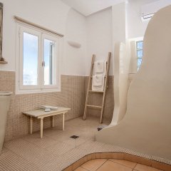 Blue Dolphins Apartments & Suites in Santorini Island, Greece from 144$, photos, reviews - zenhotels.com bathroom