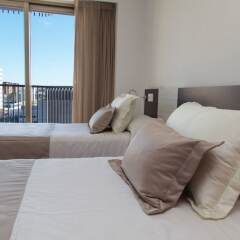 Апартаменты Pio XII Apartments комната для гостей фото 5