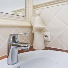 Апартаменты Stone Steps Apartments ванная