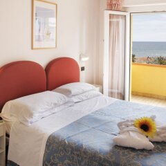 Hotel Mignon Риччоне комната для гостей фото 2