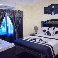 Отель Ocho Rios Villa at The Palms VI комната для гостей