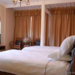 Отель Royal Garden Inn комната для гостей