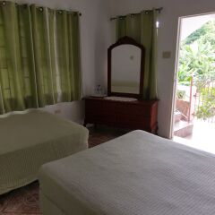 Отель Polish Princess Guest House Ямайка, Порт Антонио - отзывы, цены и фото номеров - забронировать отель Polish Princess Guest House онлайн комната для гостей фото 2