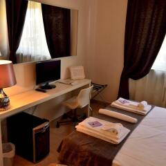 Отель Rome & Suites удобства в номере