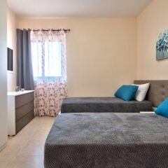 Отель First Class Apartments Ta Martin by G&G Мальта, Буджибба - отзывы, цены и фото номеров - забронировать отель First Class Apartments Ta Martin by G&G онлайн комната для гостей