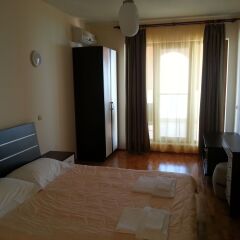Апартаменты Lighthouse Apartments And Villas Балчик комната для гостей фото 4