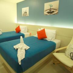 Отель The Palms Residence комната для гостей фото 4