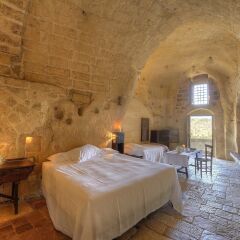 Отель Sextantio Le Grotte Della Civita Матера комната для гостей фото 5